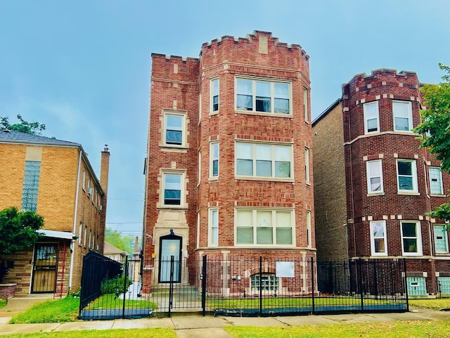 view of property featuring a fenced front yard