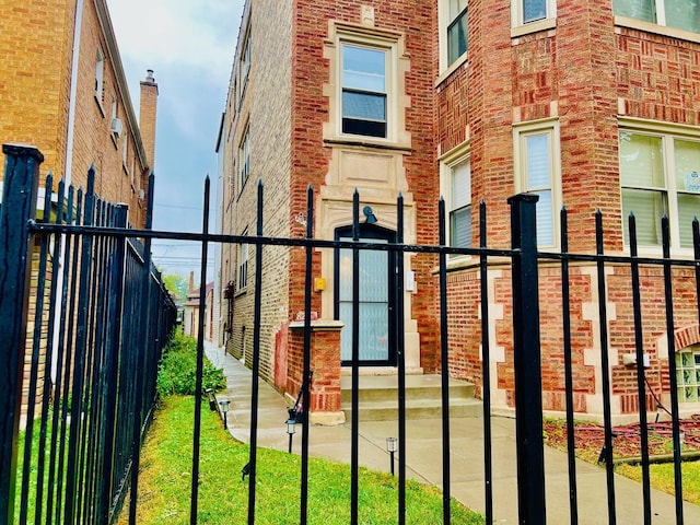 view of gate featuring fence