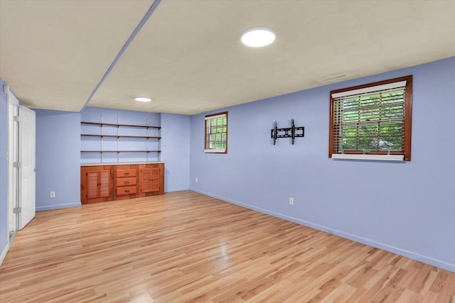 604 Park Lane Dr, Champaign, IL 61820 - spare room featuring light wood-style flooring and baseboards