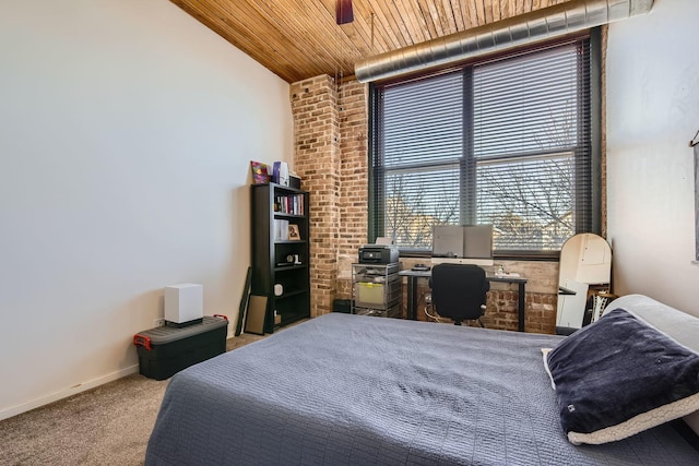 carpeted bedroom with wooden ceiling and baseboards