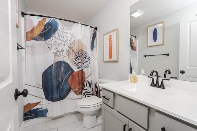 bathroom with toilet, marble finish floor, curtained shower, and vanity