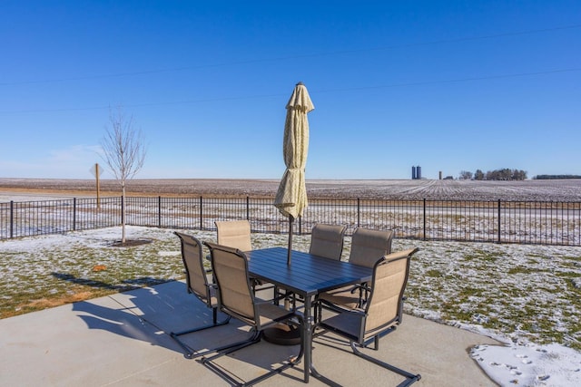 view of patio with outdoor dining area and a fenced backyard