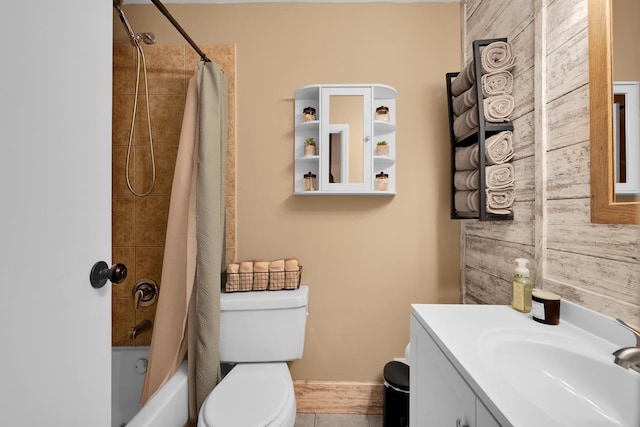 full bathroom with shower / tub combo, vanity, and toilet