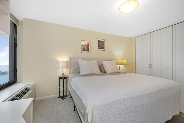 155 N Harbor Dr Unit 4505, Chicago, IL 60601 - bedroom with a closet, a wall mounted AC, light colored carpet, and baseboards