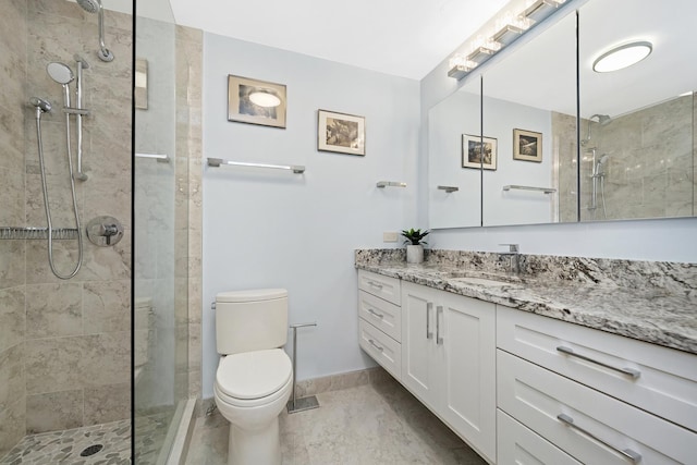 155 N Harbor Dr Unit 4505, Chicago, IL 60601 - bathroom featuring vanity, toilet, baseboards, and tiled shower