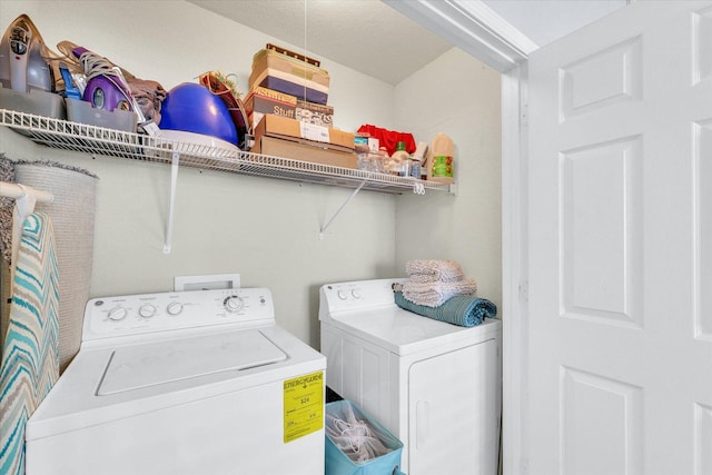 laundry room with laundry area and washer and dryer