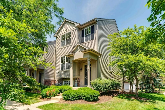 1061 Chadwick Dr, Grayslake, IL 60030 - view of front facade featuring a front yard