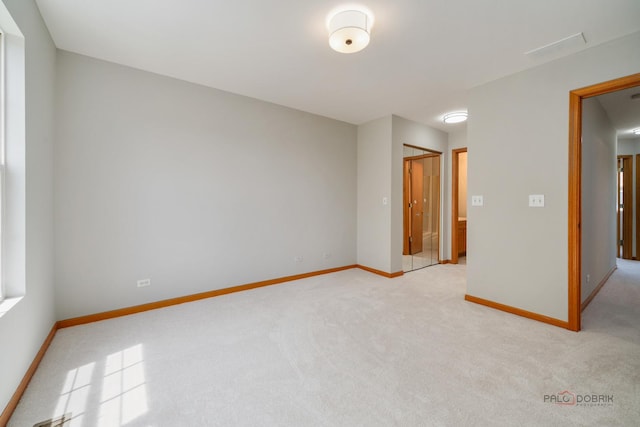 1061 Chadwick Dr, Grayslake, IL 60030 - unfurnished room with light carpet and baseboards