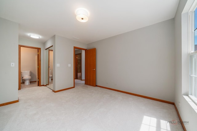 1061 Chadwick Dr, Grayslake, IL 60030 - unfurnished bedroom with light carpet and ensuite bath