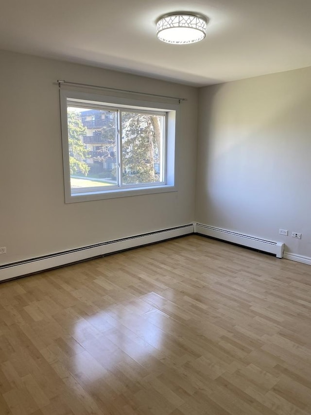 empty room featuring wood finished floors