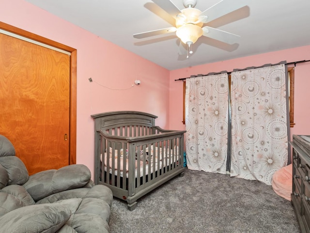 carpeted bedroom with ceiling fan