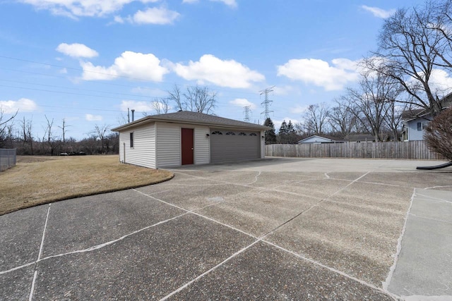 detached garage with fence