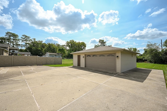 detached garage with fence