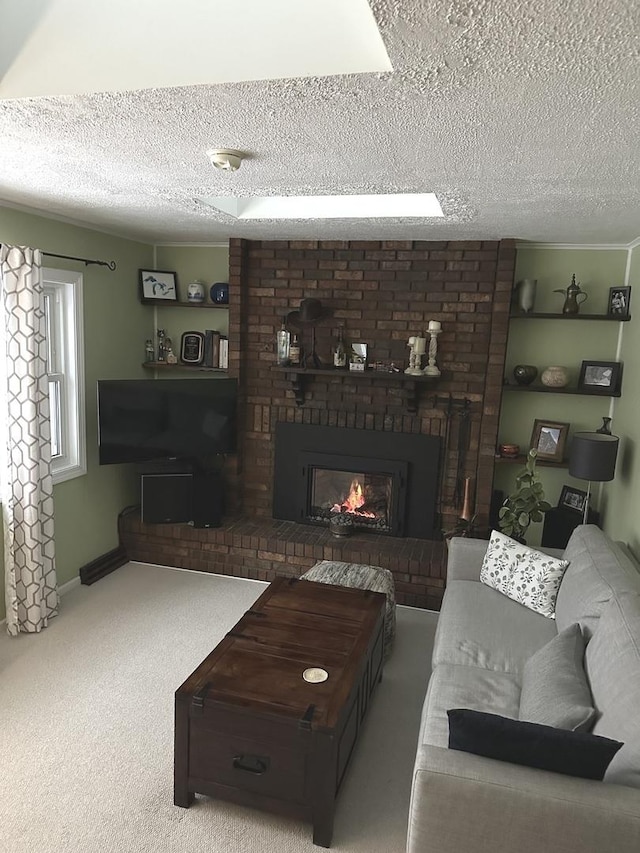 carpeted living room featuring a fireplace and a textured ceiling