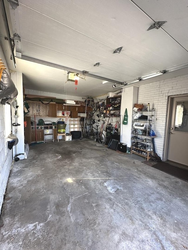 garage featuring a garage door opener