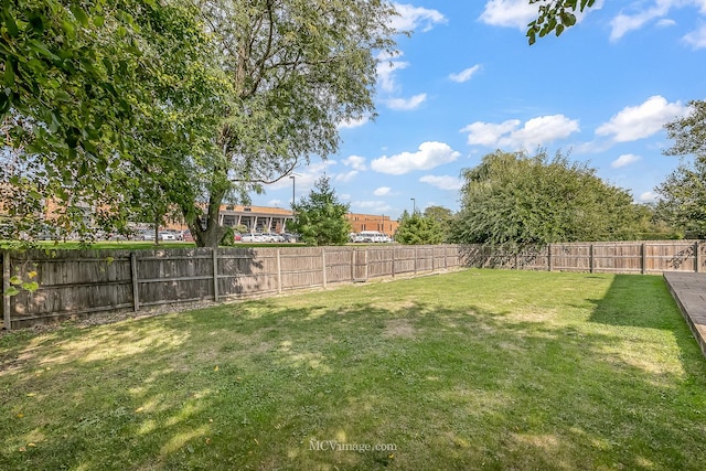 view of yard featuring a fenced backyard