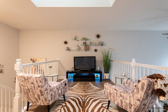 living area featuring wood finished floors