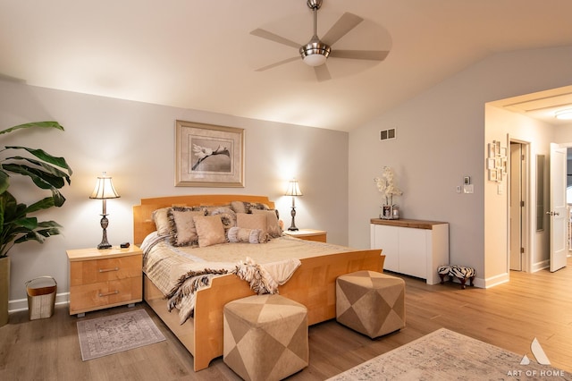 bedroom with visible vents, baseboards, lofted ceiling, light wood-style flooring, and ceiling fan