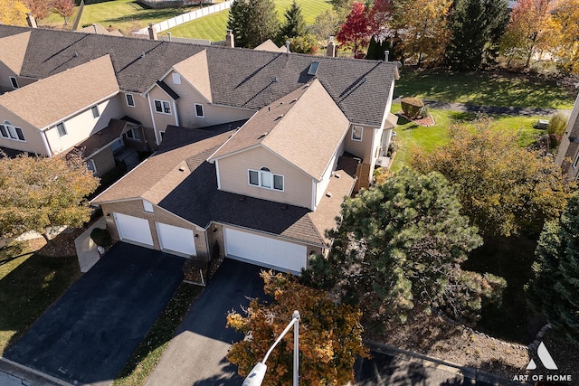 birds eye view of property with a residential view