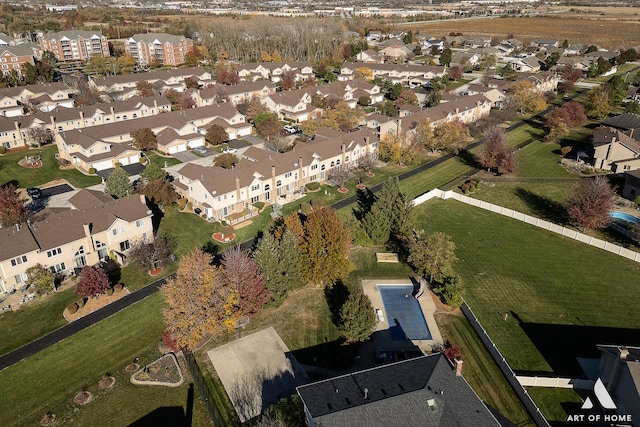 birds eye view of property with a residential view