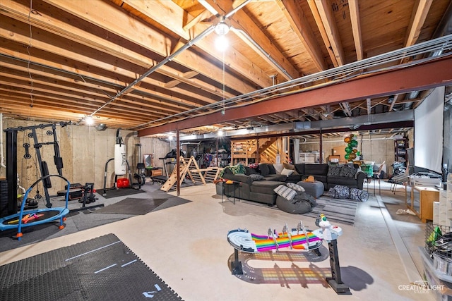 workout room featuring water heater