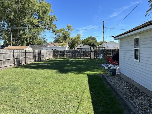 view of yard featuring a fenced backyard