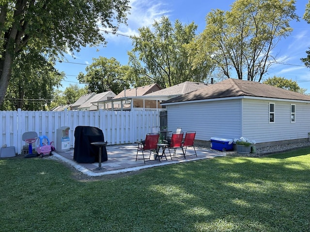 exterior space with a patio area and fence