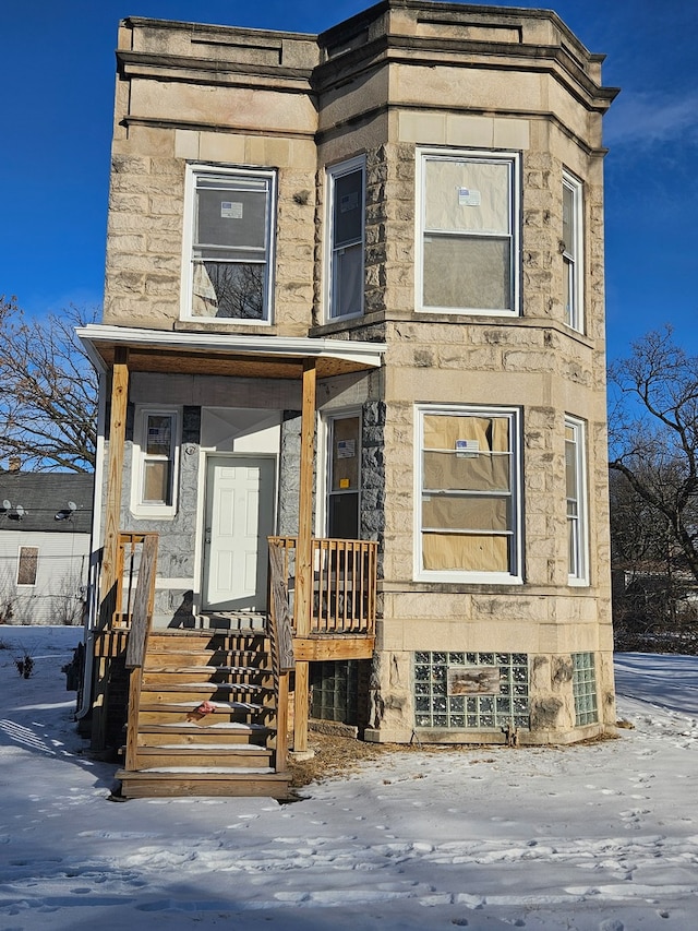 view of front of house with stone siding