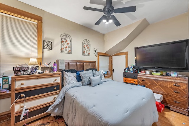 bedroom featuring wood finished floors and a ceiling fan