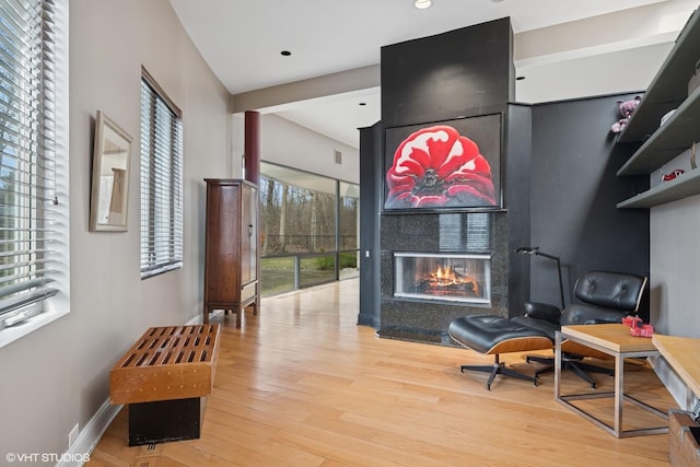 2000 Clendenin Ln, Riverwoods, IL 60015 - living area with a multi sided fireplace, wood finished floors, and recessed lighting