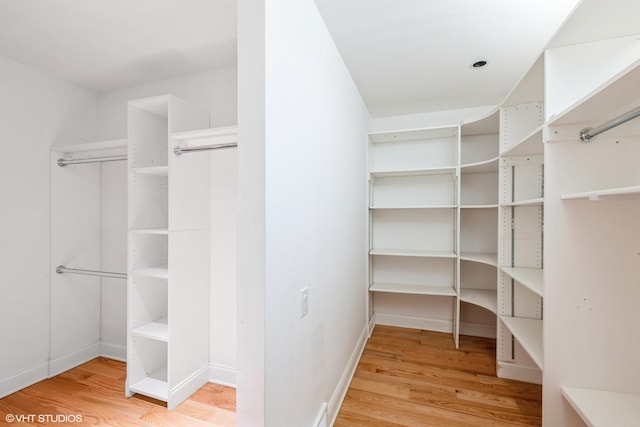 2000 Clendenin Ln, Riverwoods, IL 60015 - walk in closet featuring wood finished floors