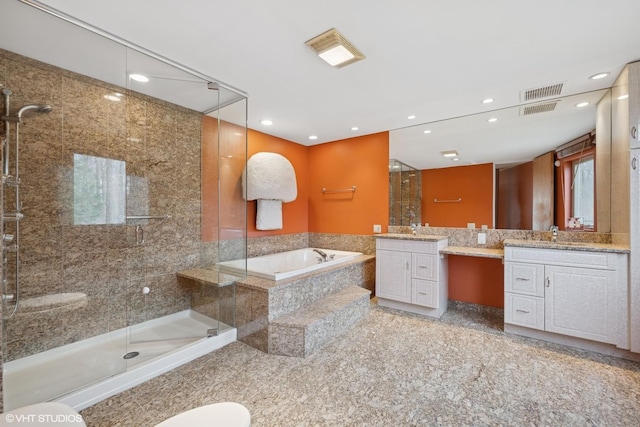 2000 Clendenin Ln, Riverwoods, IL 60015 - bathroom with a bath, a shower stall, vanity, and recessed lighting