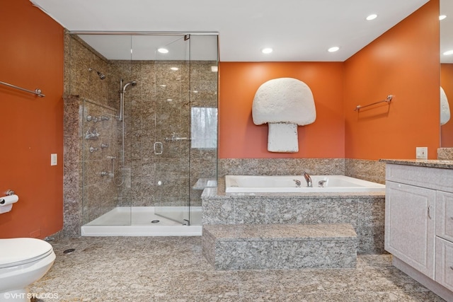 2000 Clendenin Ln, Riverwoods, IL 60015 - bathroom with a bath, a stall shower, vanity, and recessed lighting