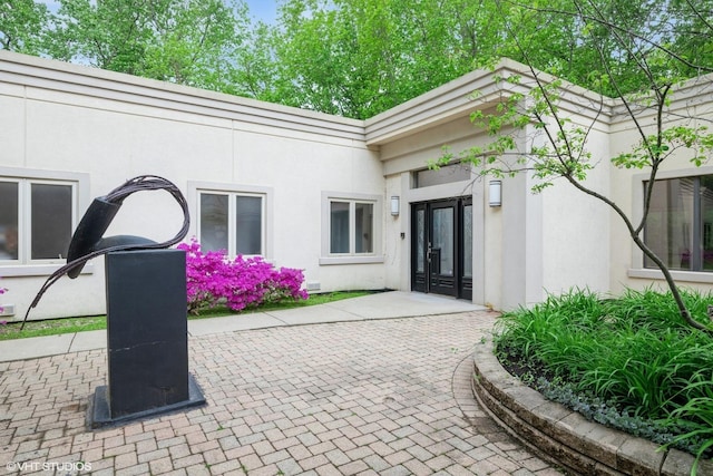 2000 Clendenin Ln, Riverwoods, IL 60015 - view of exterior entry featuring stucco siding