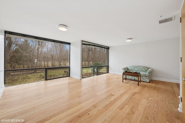 2000 Clendenin Ln, Riverwoods, IL 60015 - sitting room featuring wood finished floors and expansive windows