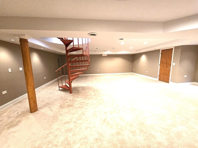 finished below grade area featuring baseboards, stairway, carpet flooring, and recessed lighting