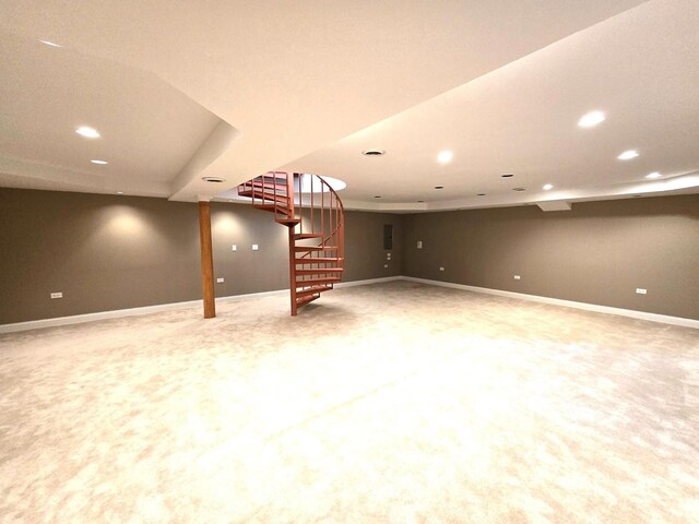 finished basement featuring recessed lighting, stairs, carpet, and baseboards