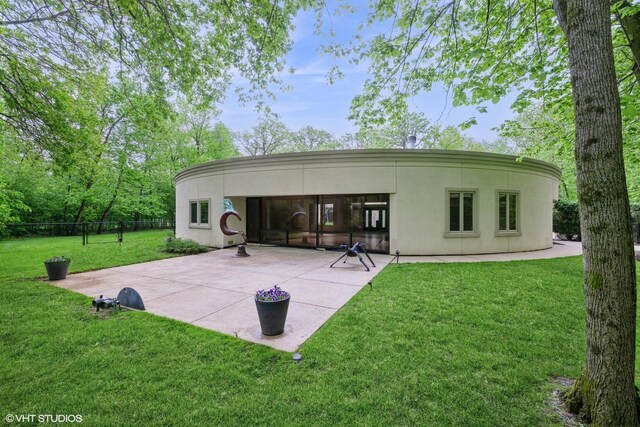2000 Clendenin Ln, Riverwoods, IL 60015 - rear view of property featuring stucco siding and a patio area