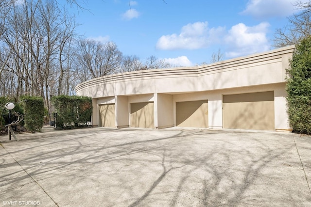 garage with driveway