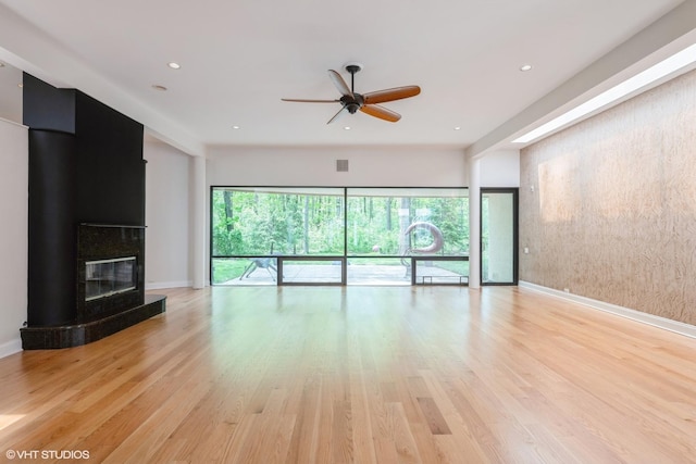 2000 Clendenin Ln, Riverwoods, IL 60015 - unfurnished living room with a ceiling fan, light wood-type flooring, a large fireplace, and recessed lighting