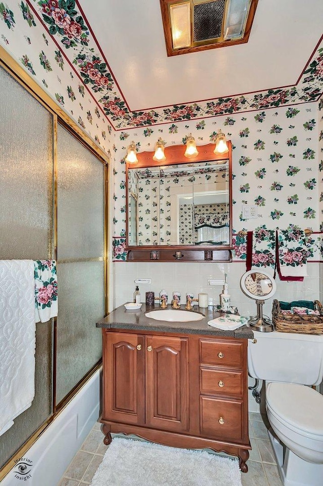 bathroom featuring tile patterned floors, visible vents, toilet, and wallpapered walls