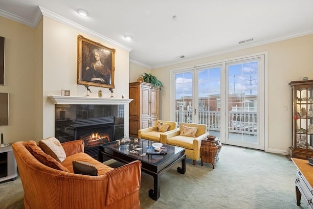 living area featuring carpet, ornamental molding, a tiled fireplace, and visible vents