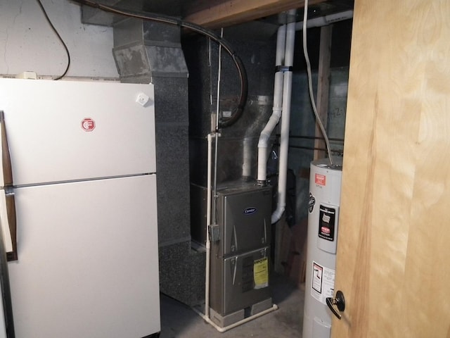 utility room with electric water heater