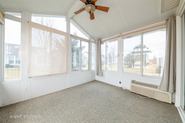 unfurnished sunroom with a wall mounted air conditioner, a ceiling fan, and vaulted ceiling with beams