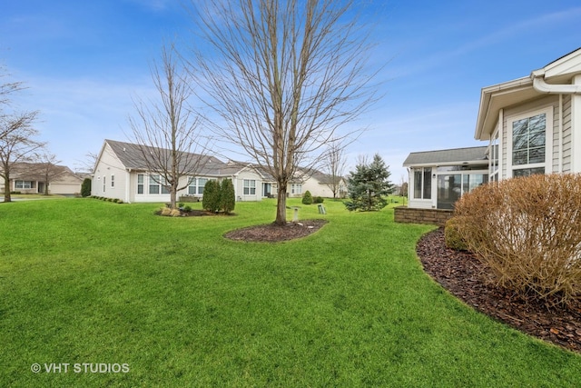 view of yard with a residential view