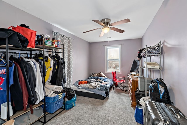 carpeted bedroom featuring a ceiling fan