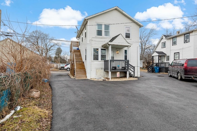 view of front of house with stairs