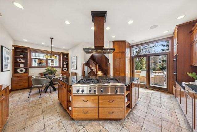 kitchen with a center island, stainless steel gas stovetop, stone tile floors, and open shelves