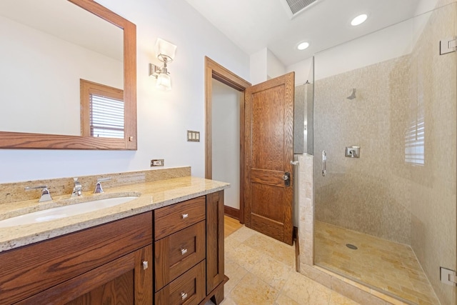 full bathroom featuring recessed lighting, vanity, visible vents, a shower stall, and tile patterned floors