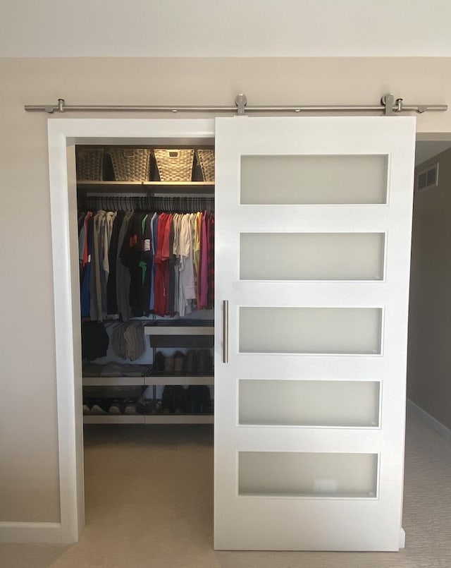 closet featuring visible vents